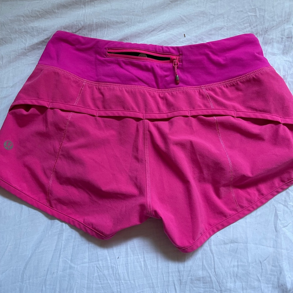 Lululemon size 2 pink lined run shorts. 2.5 inseam
